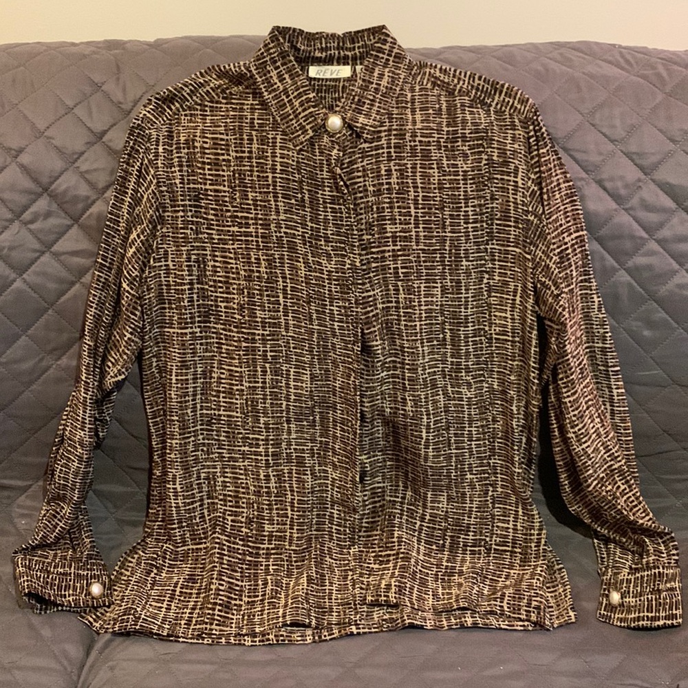 100% silk blouse by Reve. Like new.